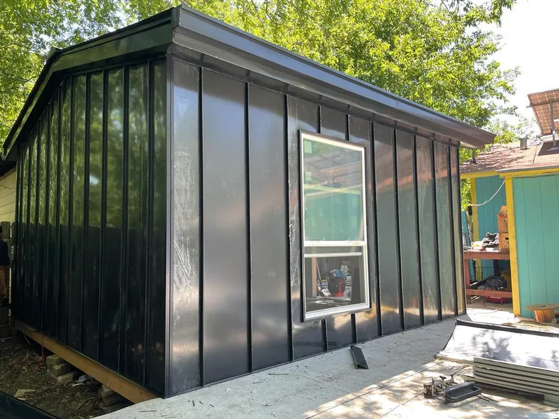 Black standing seam metal wall panels for Metal Roof Installation in Novi