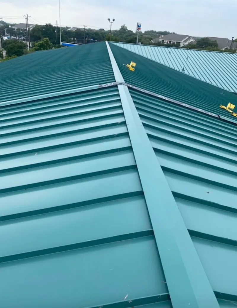 Green commercial metal roof ridge and valley for Metal Roof Repair in Novi