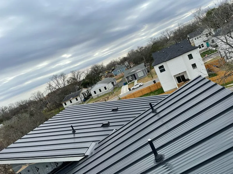 Standing seam metal roof panels with vents for Skylight Repair in Novi